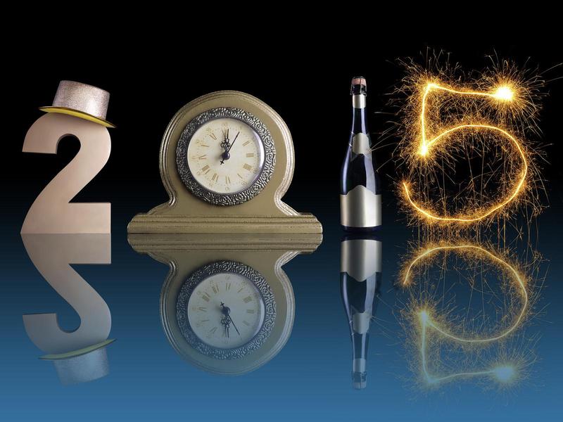 new_year_2015_made_of_golden_digit_two_table_clock_bottle_of_champagne_and_party_fireworks_with_mirror_reflection_effect.jpg